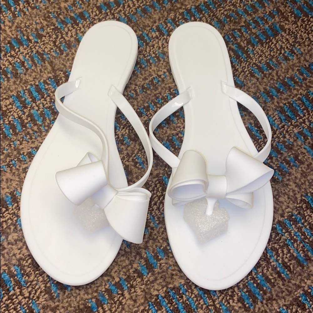 White bow flip flops